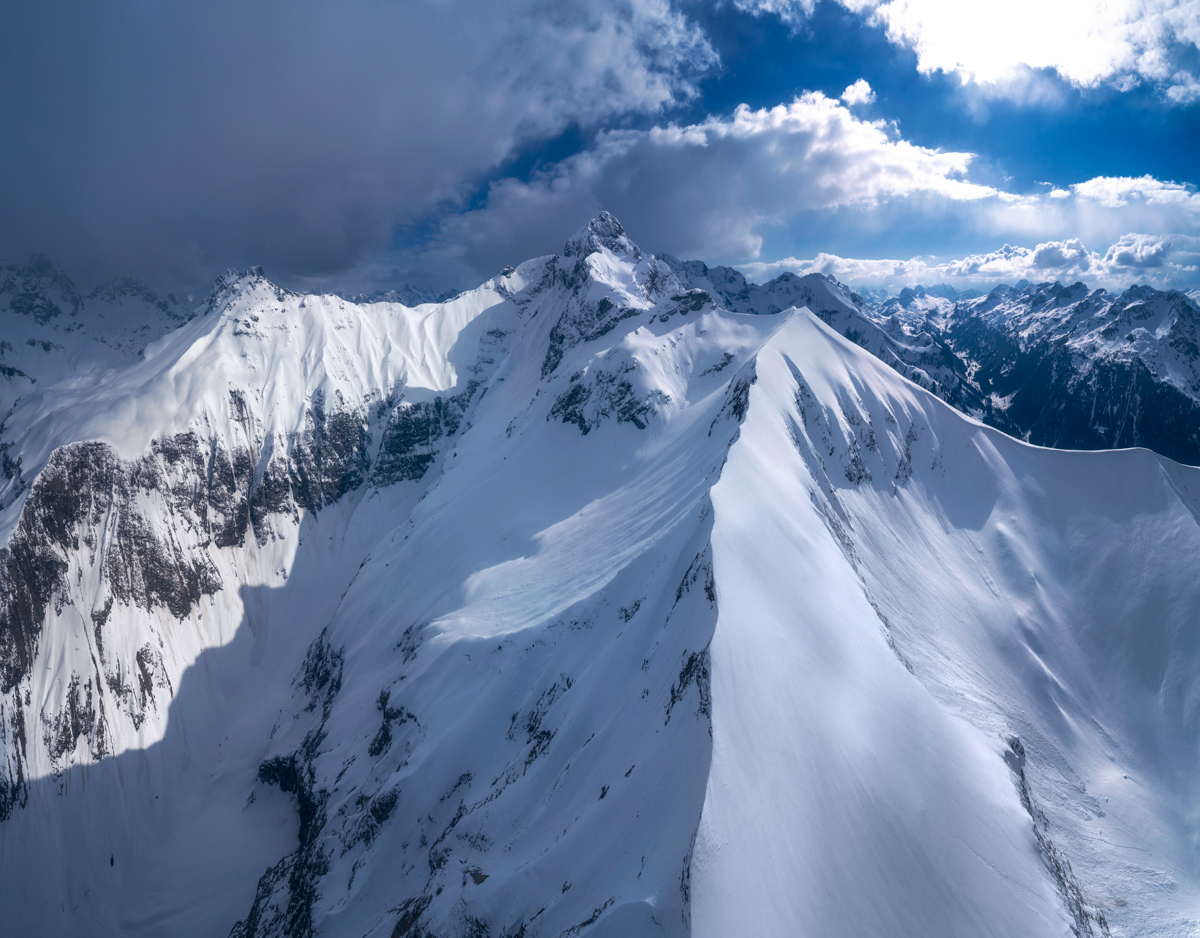 Oberstdorf, Trettachtal Hochalpen im Winterkleid, Wolkenmeer über verschneiten Gipfeln - Landschaftsfotografie Allgäu