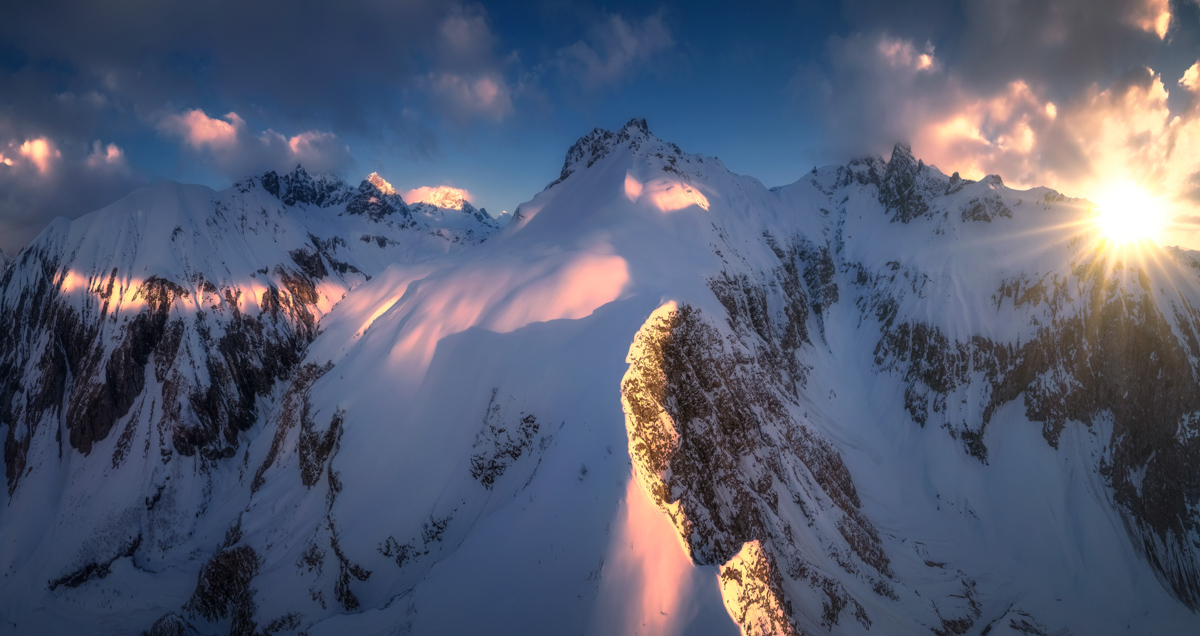 Oberstdorf, Sonnenstern an Hochfrott und Mädelegabel, Wintersonne bei Einödsbach - Bergfotografie Allgäu
