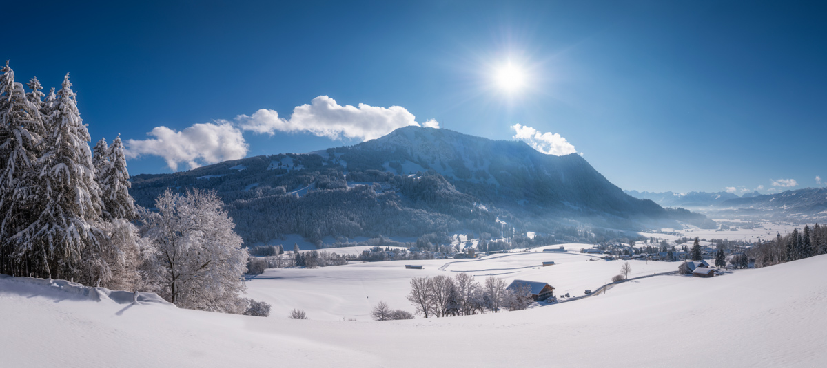 Rettenberg, Grünten mit Sonnenstern, Winteridylle am Grüntenhang - Landschaftsfotografie Oberallgäu