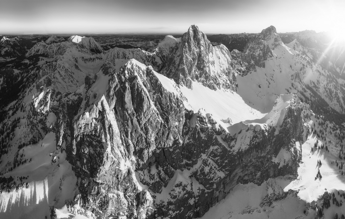 leinwand schwarz weiß wandbilder foto kaufen Tirol Lechtal Gimpel Rotflüh Sonnenaufgang Alpenglühen Fernpass Tannheim Haldensee Hahntenjocher himmel winter verschneit schnee sonne