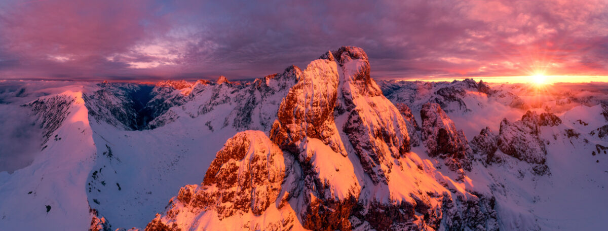 Panorama Allgäu Alpen Berge Oberstdorf Winter Schnee Sonnenuntergang Alpenglühen Krottenspitze Großer Krottenkopf Nebel Oberallgäu orange rot blau